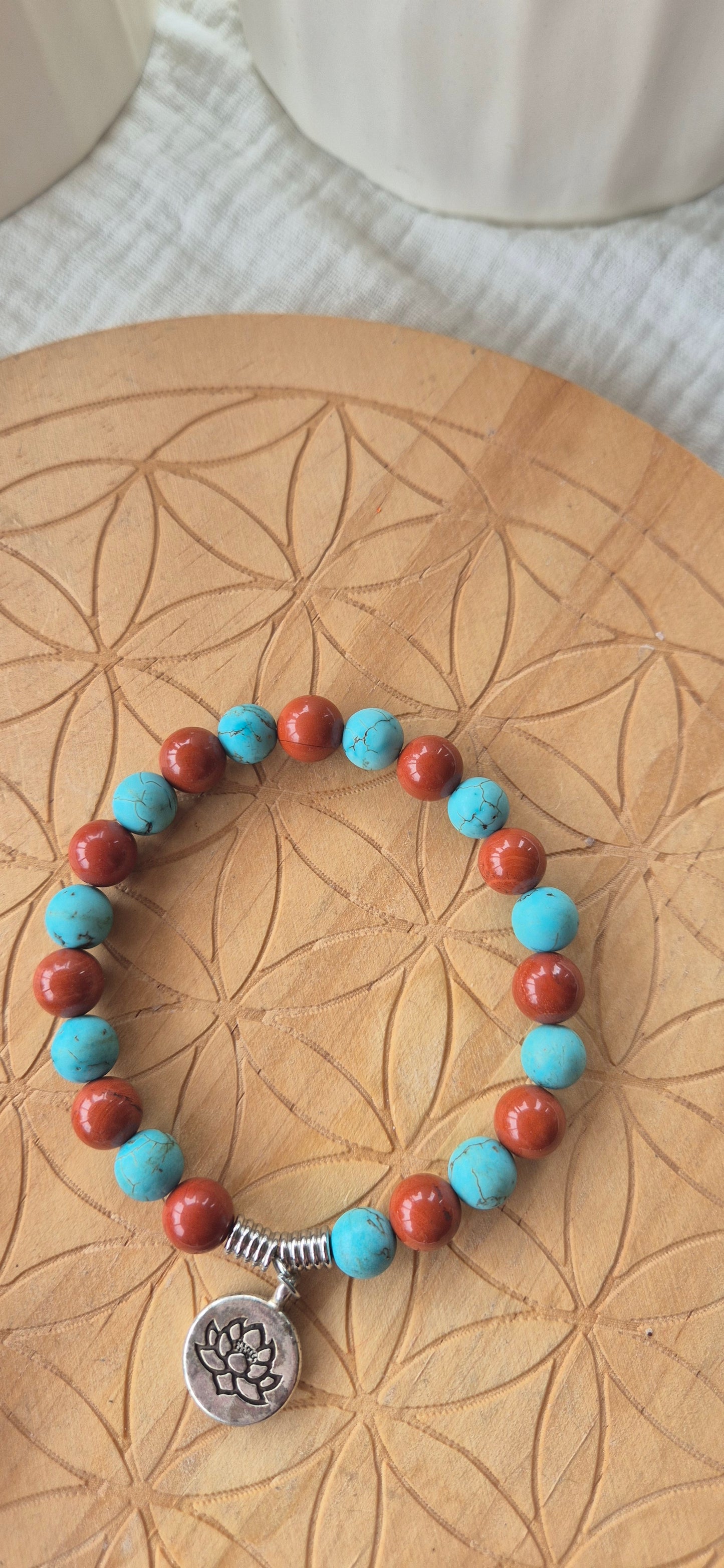"Earth & Sky" Bracelet – Turquoise Howlite, Red Jasper & Flower Charm